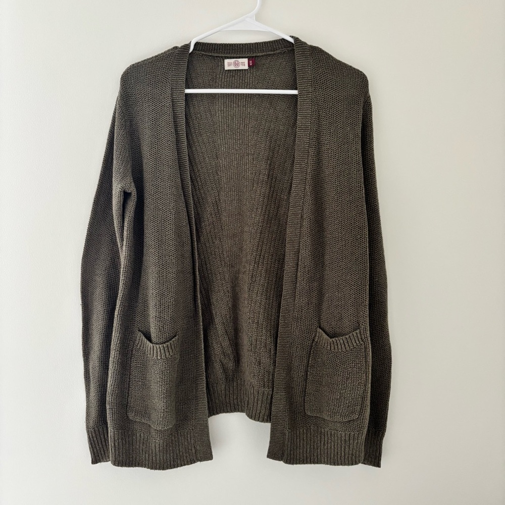 green cardigan with pockets